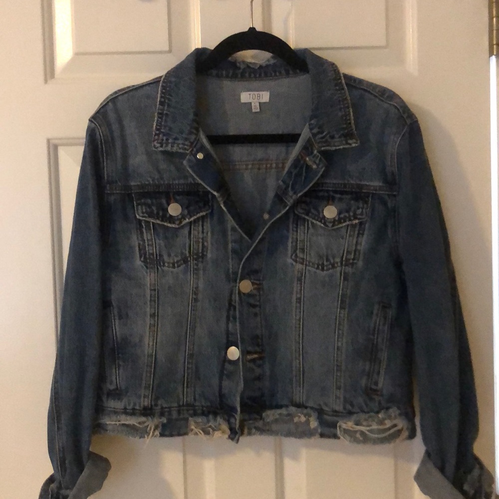 Distressed denim jacket